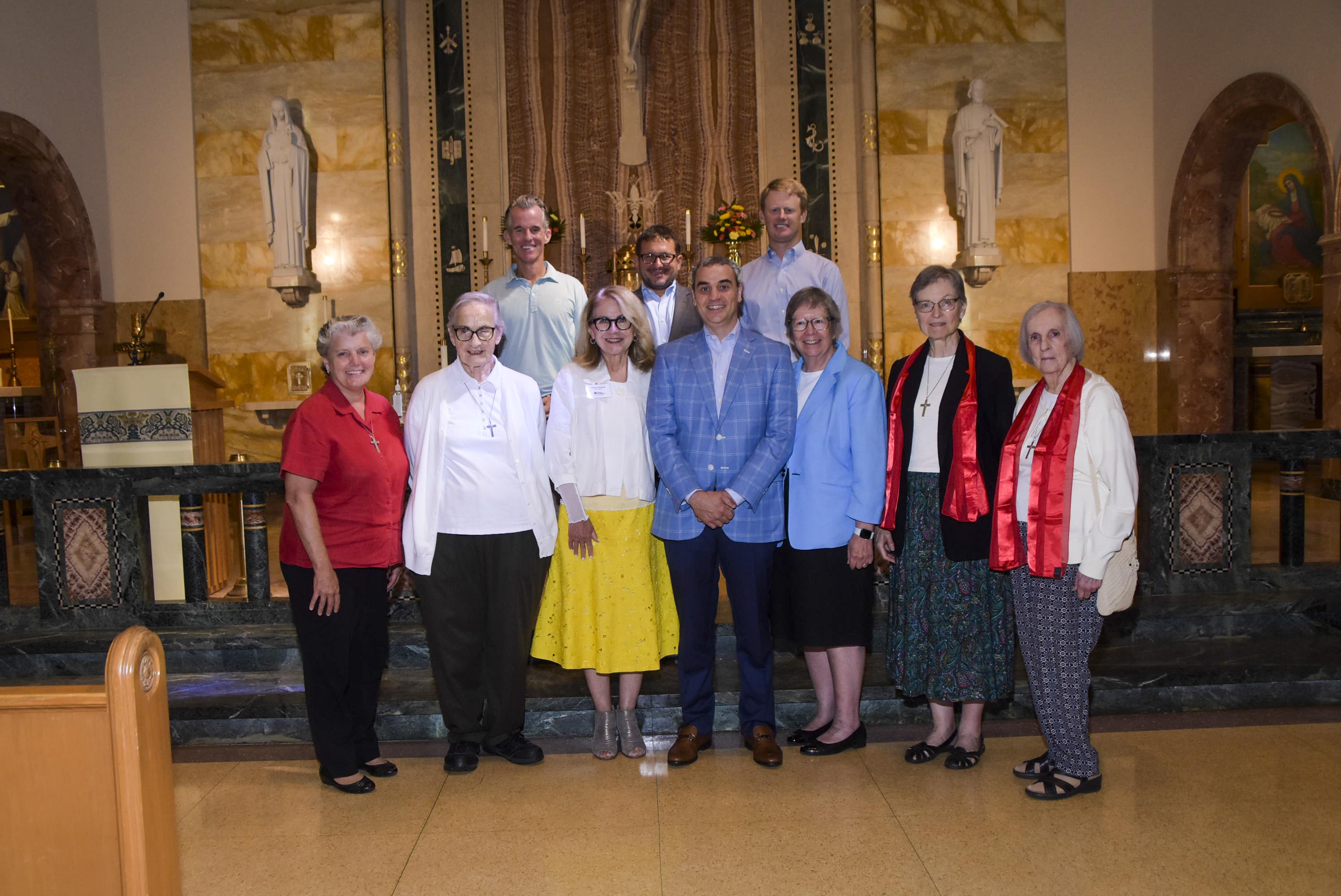 Dr. Dawn Nichols (third from the left) with RSCJ and members of Villa Duchesne's board of trustees. (Photo courtesy of Villa Duchesne)
