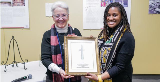 Diane Roche, RSCJ, receives the Father John O’Connor Award for Empowerment. (Photo by Catholic Charities )