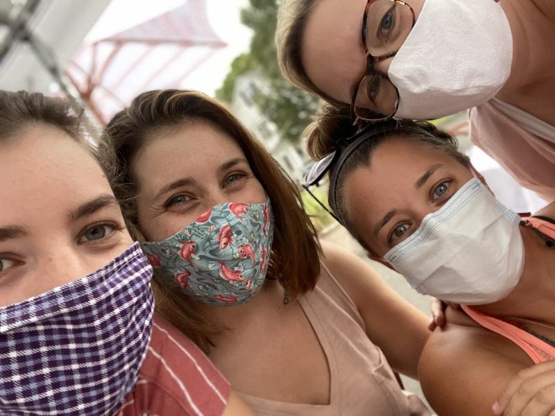 Associate Lori Wilson (right) with her three daughters during the COVID-19 pandemic summer of 2020.