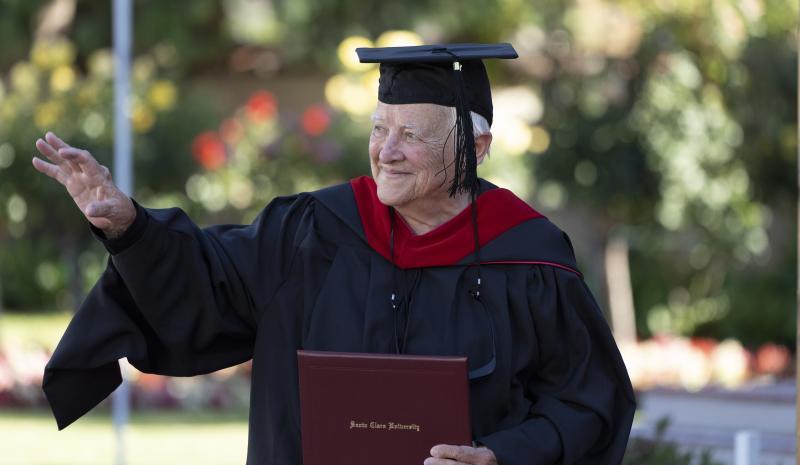 Judith Roach, RSCJ, walks across stage during her commencement ceremony  at Santa Clara University. (Photo courtesy of  Santa Clara University)