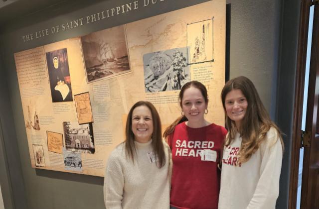 Left to Right: Tricia Heeney,  Lilly and Gabriella at the Shrine of Saint Rose Philippine Duchesne. (Photo courtesy of Lisa Tebbe)