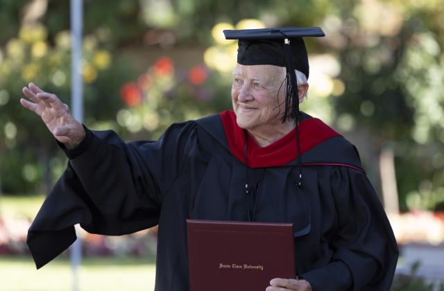 Judith Roach, RSCJ, walks across stage during her commencement ceremony  at Santa Clara University. (Photo courtesy of  Santa Clara University)