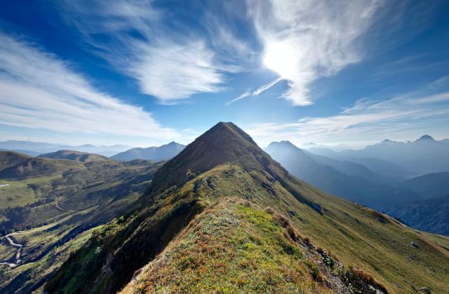 Mountain top photo by Pierre Van Crombrugghe on Unsplash