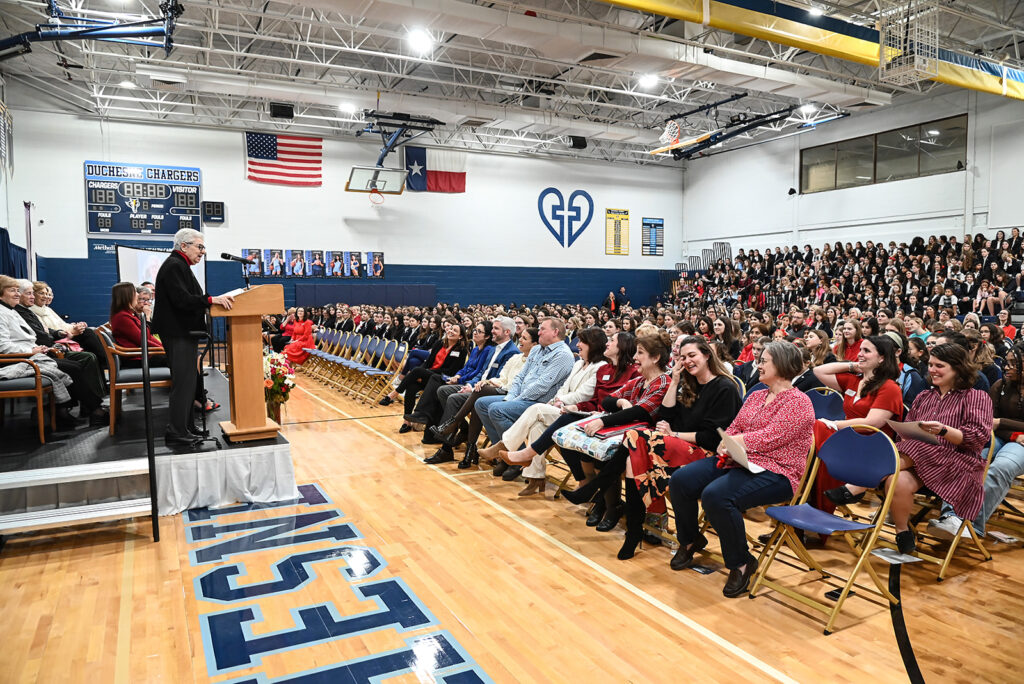 Sister Karam speaks during the service at Duchesne.