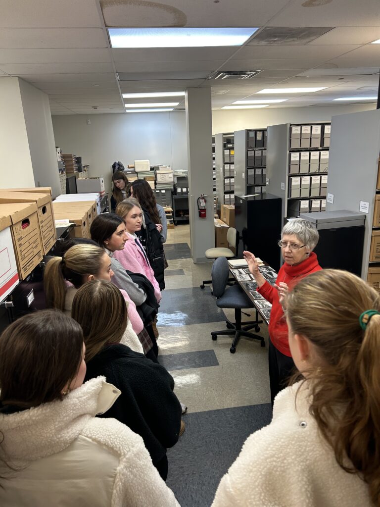 Mary Charlotte, RSCJ, speaks to students at the USC Province archives.
